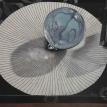Crystal ball on a Fornasetti plate