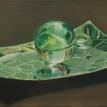 Crystal ball on a green tray